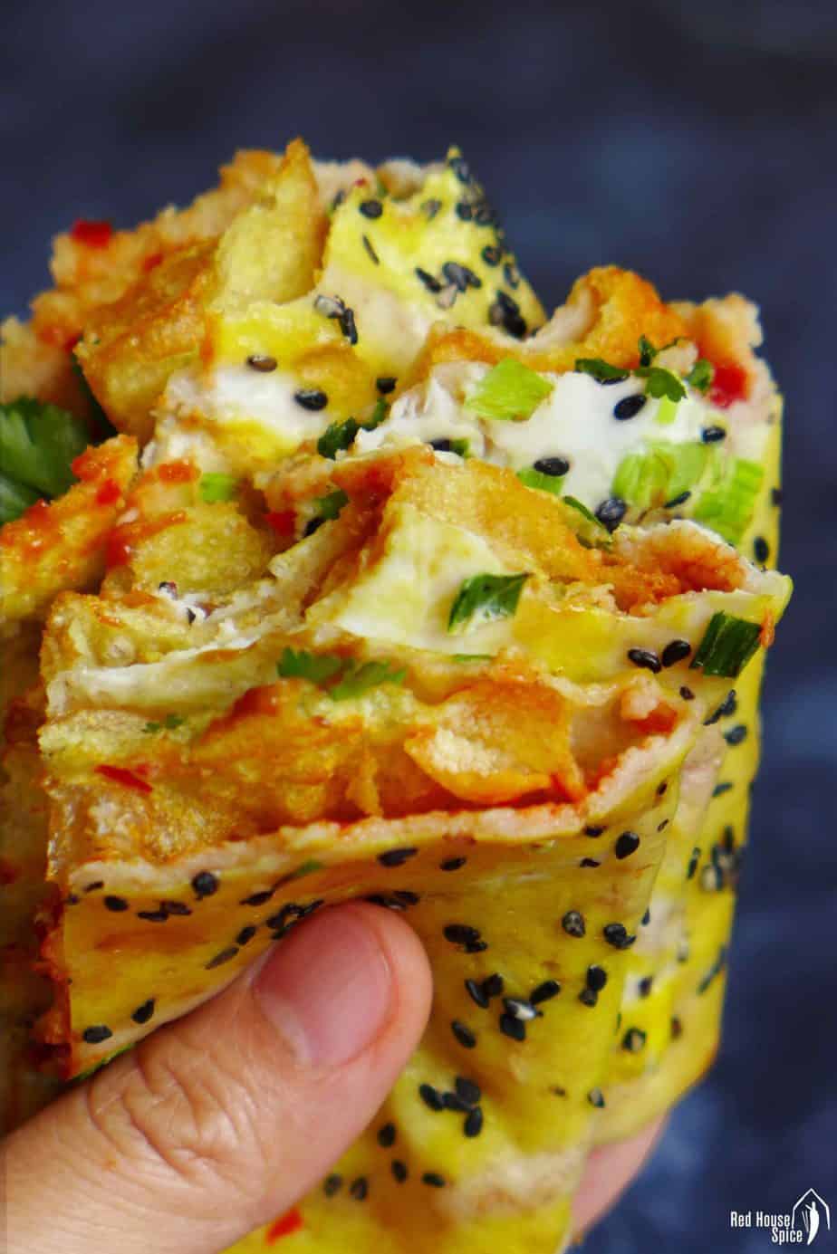 A half eaten Chinese crepe