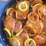 braised chicken with lemon in a skillet.