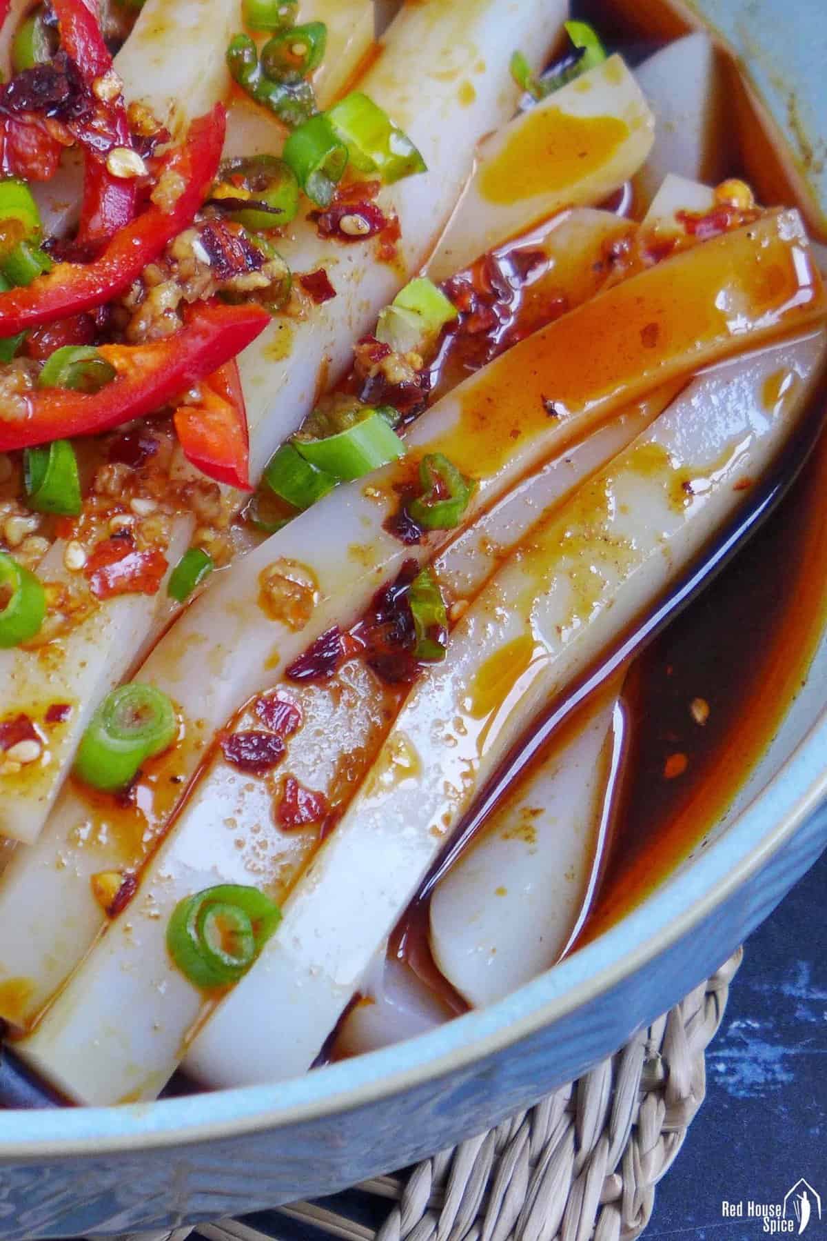 Mung bean jelly noodles covered with chili oil.