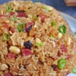 Chinese sticky rice on a plate with overlay text that says Lo Mai Fan.