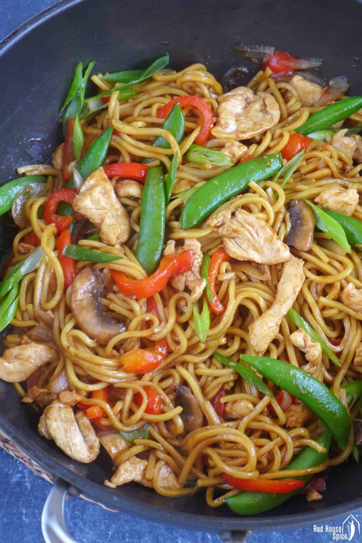 chinese Lo Mein in a wok.
