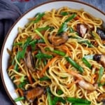 longevity noodles with mushroom, carrot and Chinese chives.