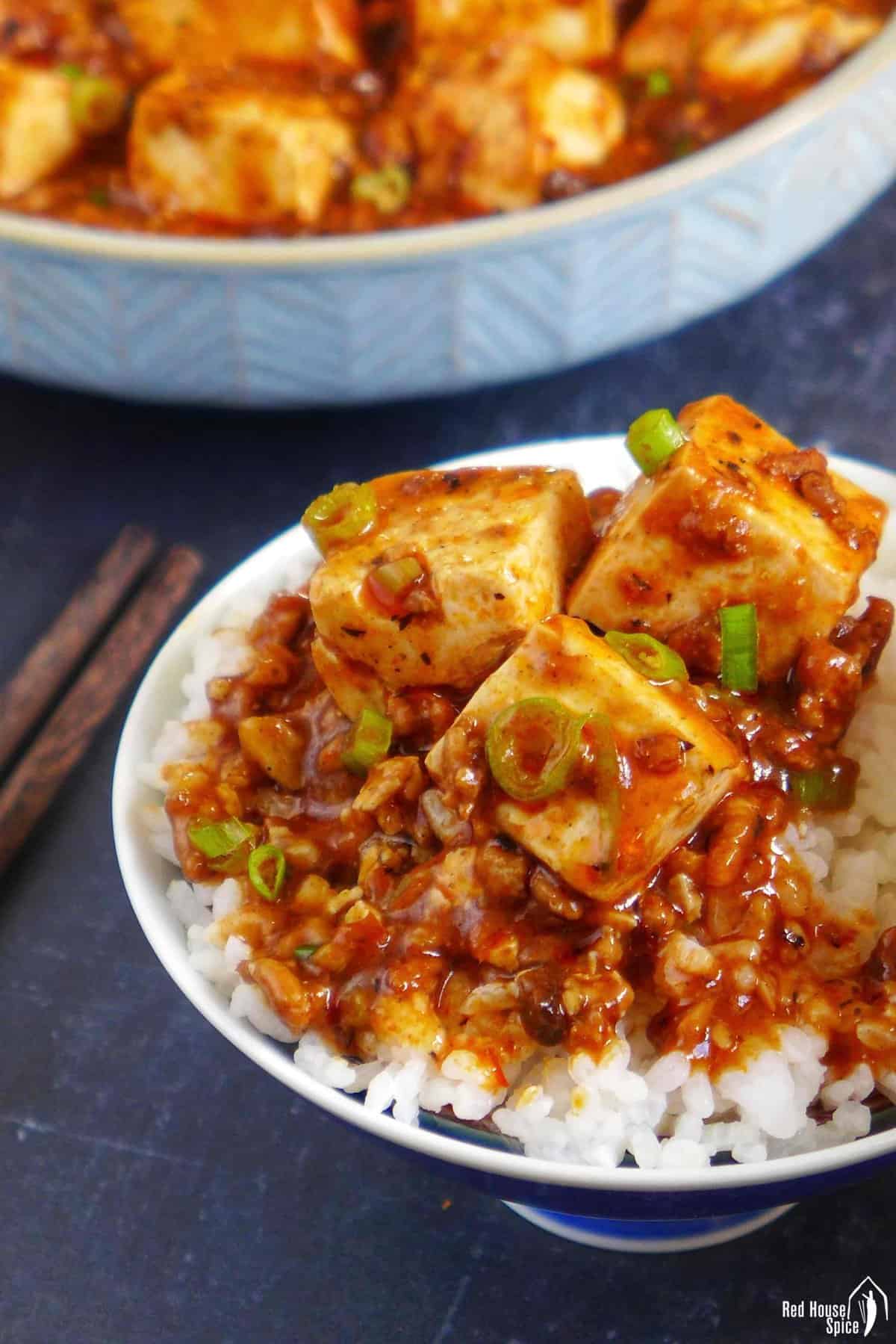 mapo tofu over a bowl of rice
