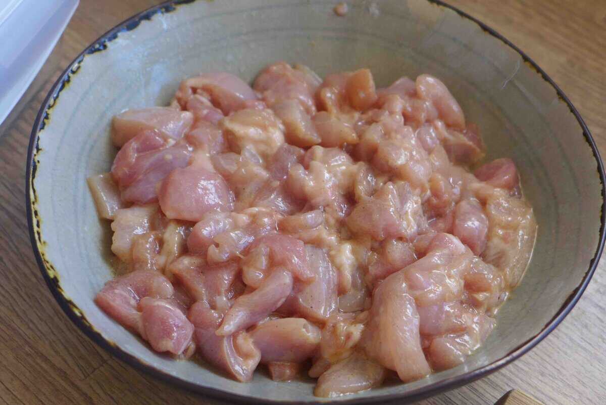 marinating chicken thigh pieces.