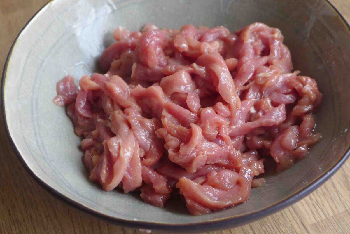 marinating pork strips.