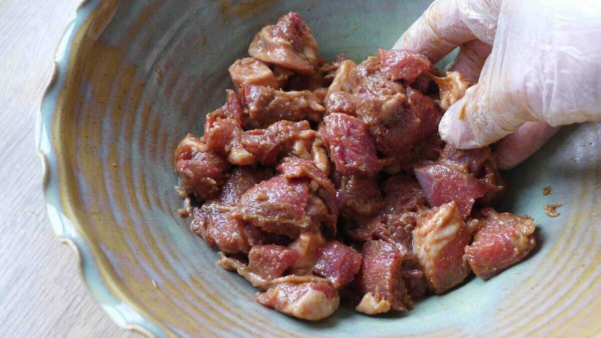 marinating lamb cubes.