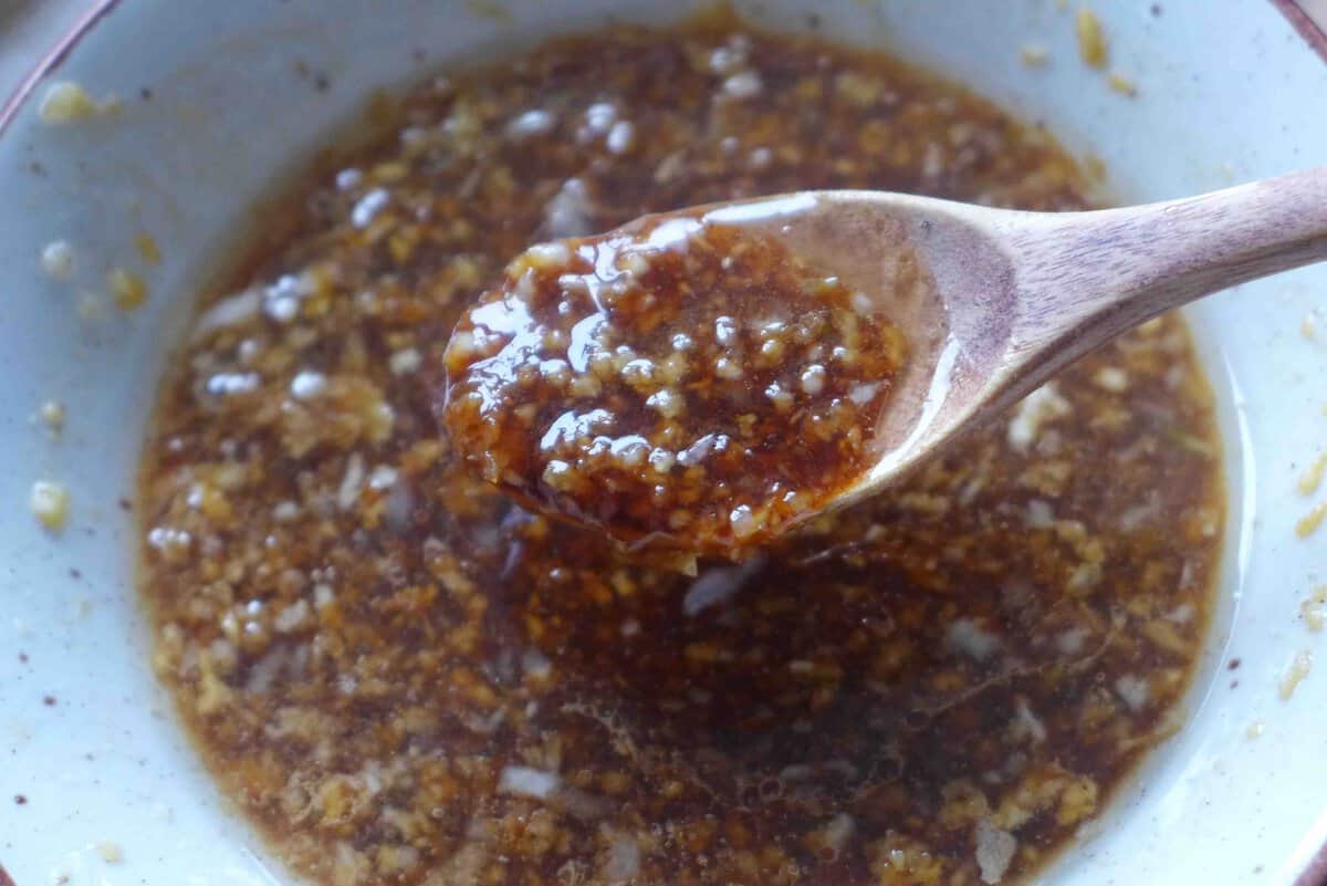 mixing garlic sauce.