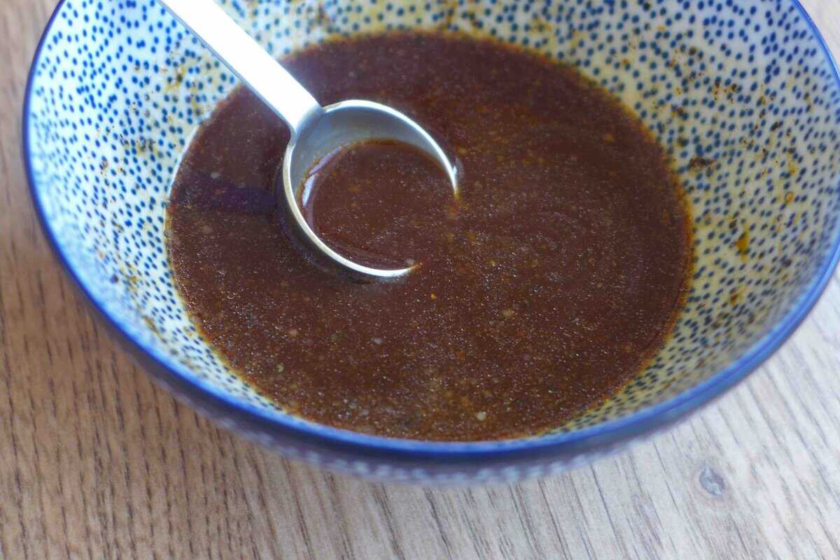 mixing sauce in a bowl.