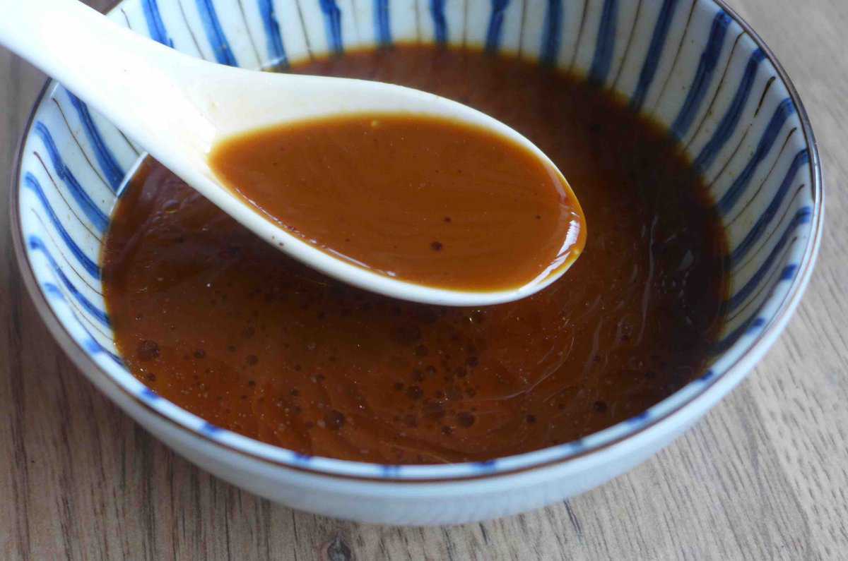 mixing sauce in a bowl.