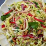 napa cabbage salad with chili, onion, cilantro and peanuts.