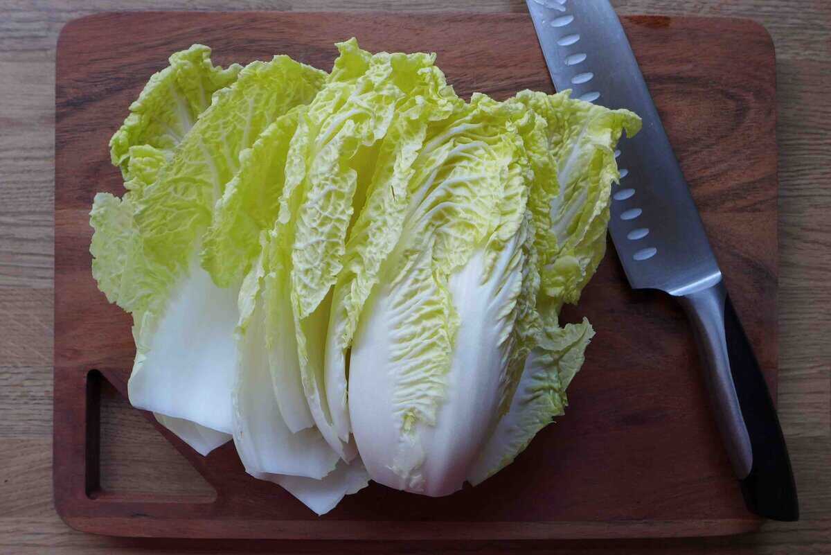 napa cabbage on a chopping board.
