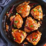 6 oyster sauce chicken thighs in a skillet.