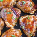 chicken thighs in thick sauce with overlay text that says oyster sauce chicken.