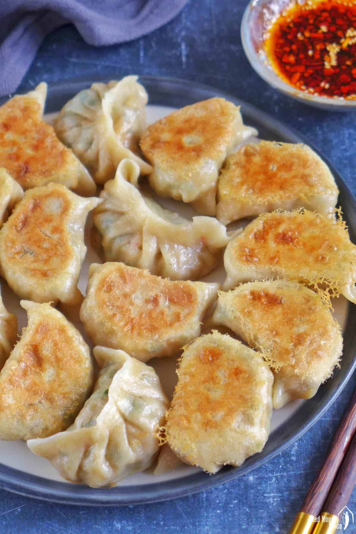 pan-fried kimchi dumplings showing their crispy crust.