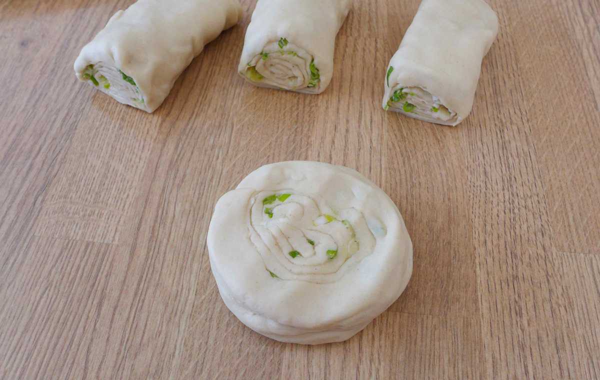 a pressed uncooked scallion pancake