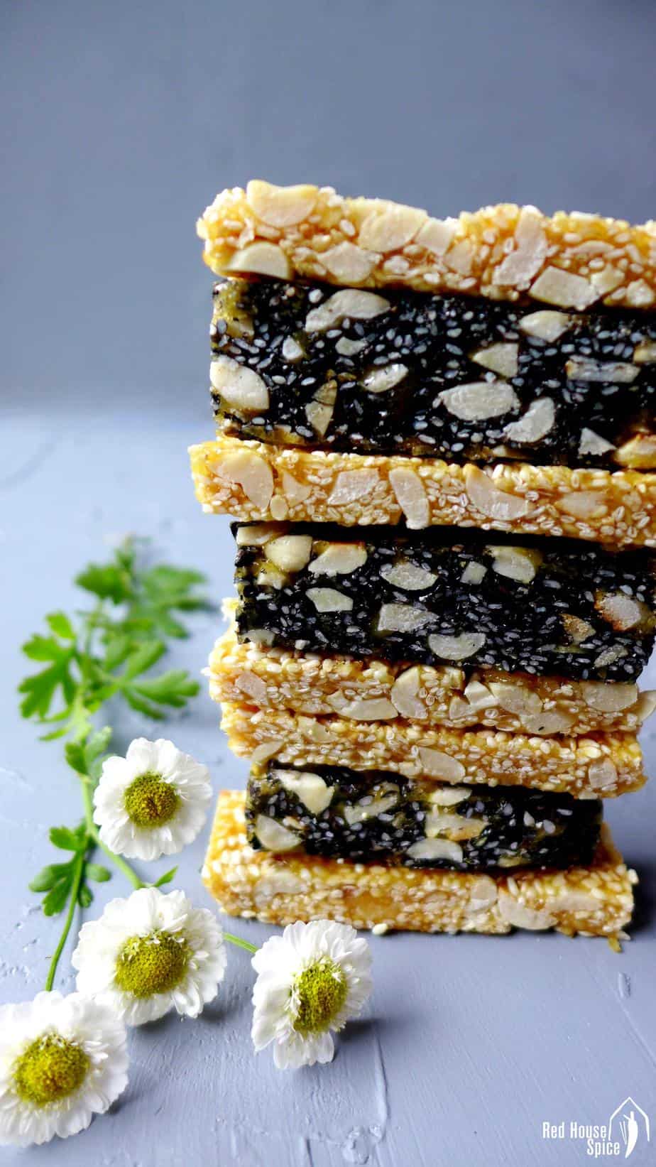 Peanut & sesame brittle in a pile.