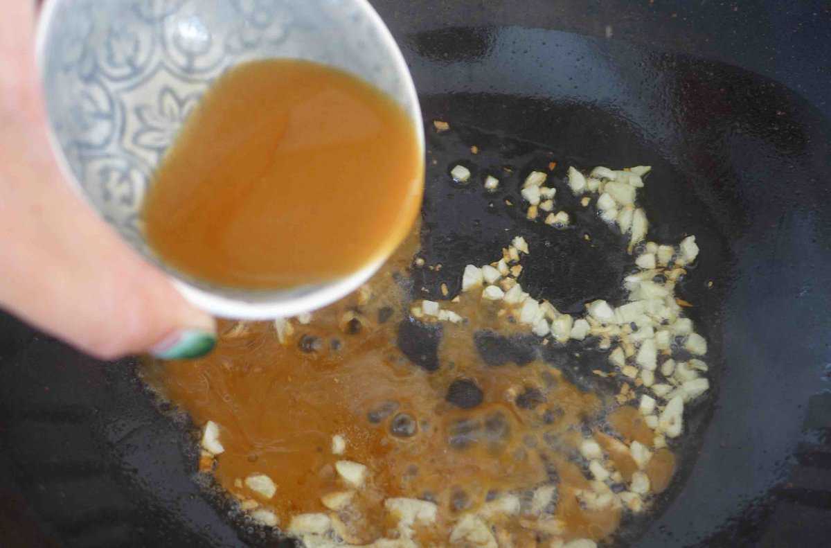 pouring sauce.