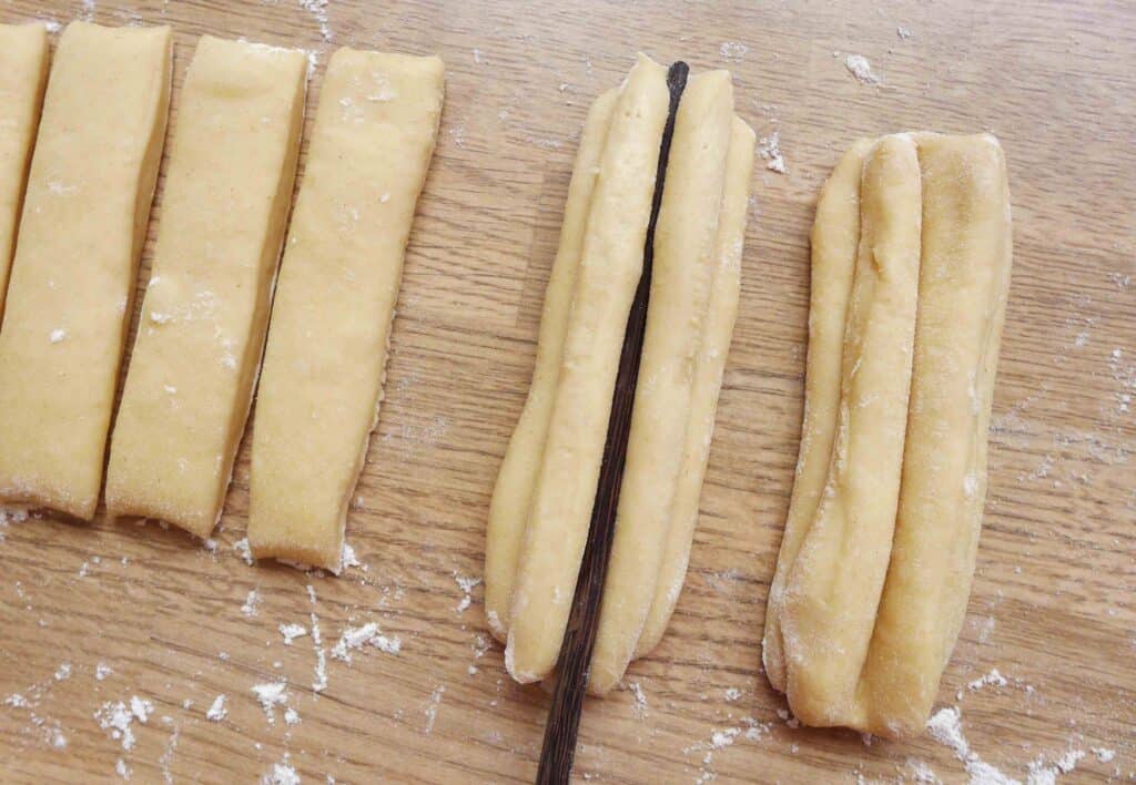 Pressing dough pieces with a chopstick