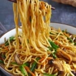 chopsticks pulling longevity noodles.