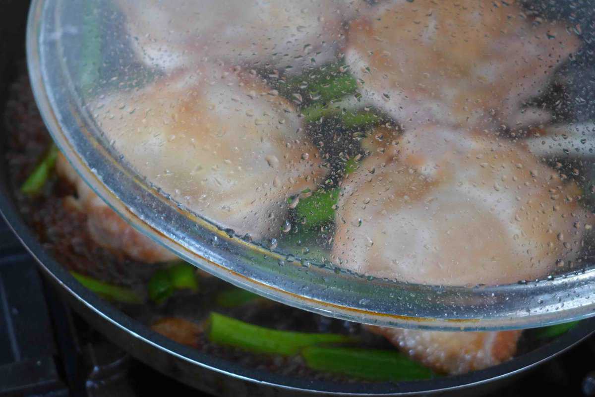 covering the skillet with a lid.