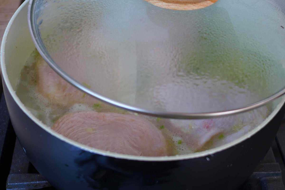 putting lid over a pot