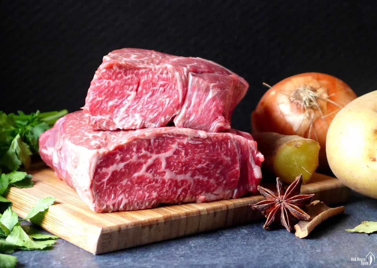 two pieces of raw beef