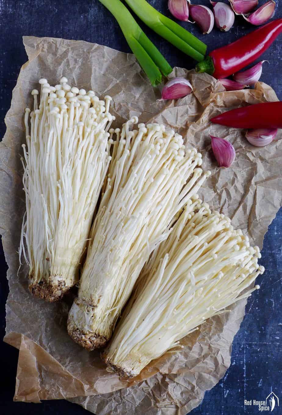 raw enoki mushroom, garlic, chili and scallions
