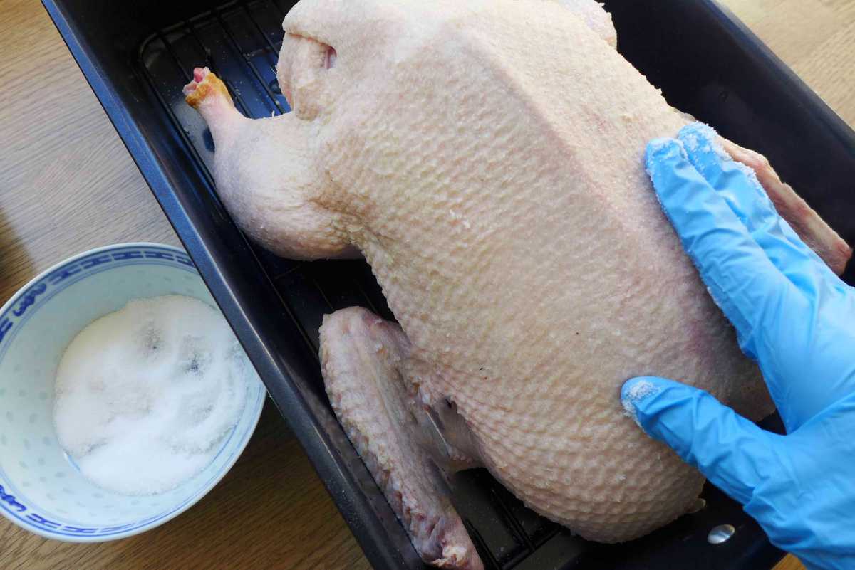 rubbing salt over duck skin