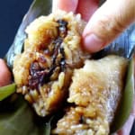 an open zongzi with overlay text that says stick rice dumping.
