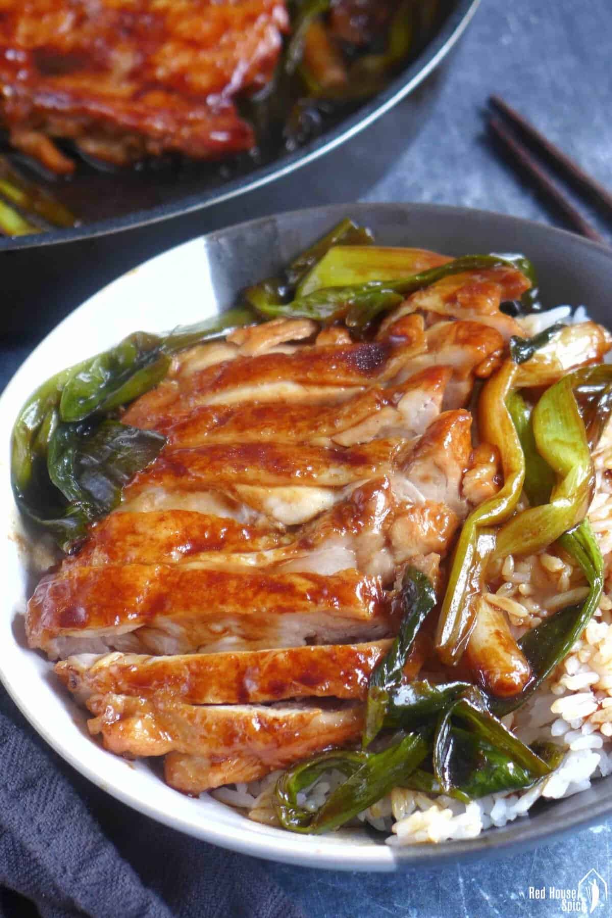 scallion chicken chops over steamed rice.