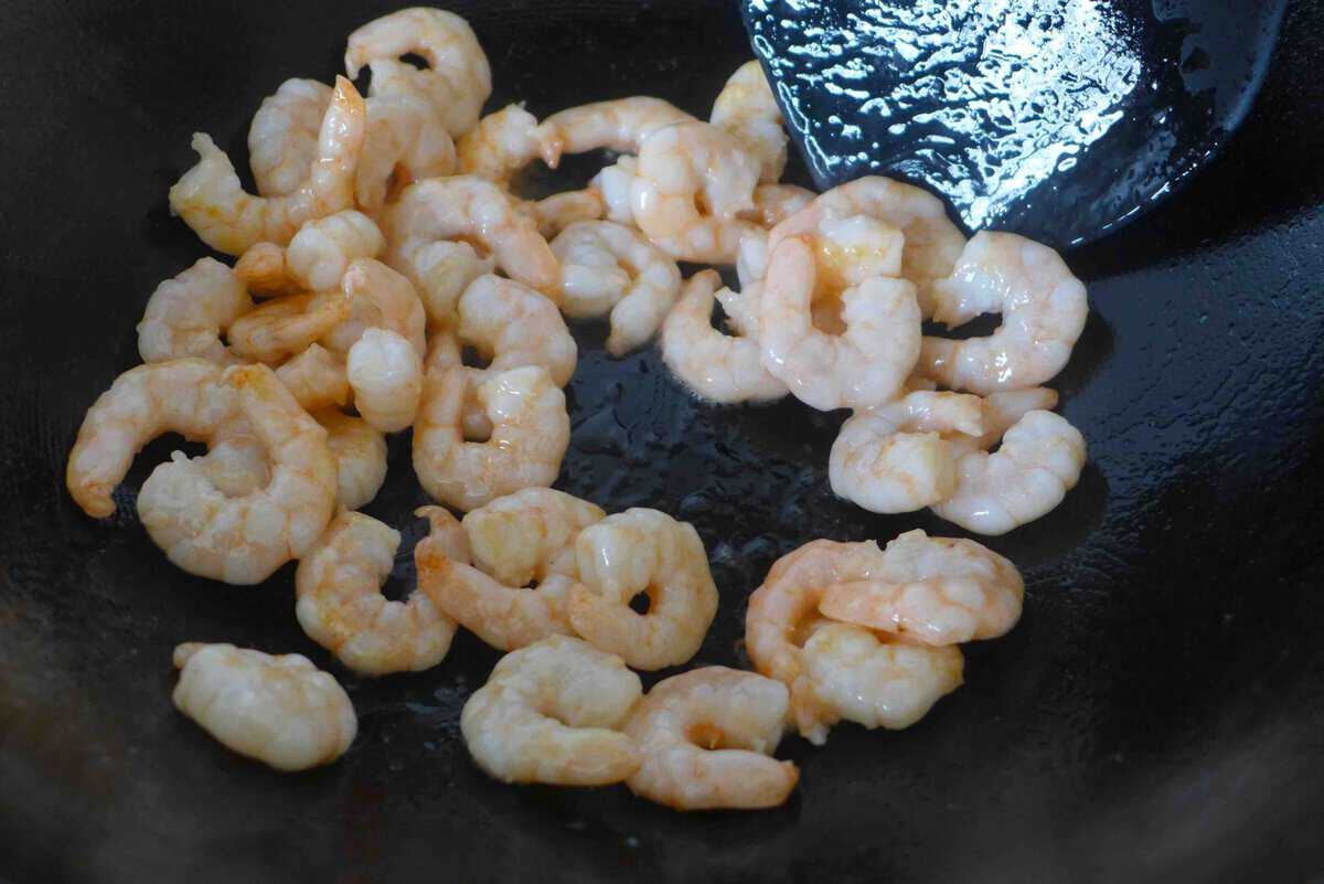 frying shrimp in oil.