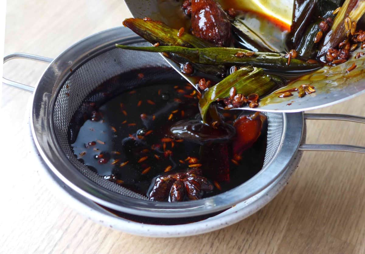 draining spiced sweet soy sauce.