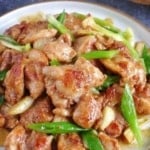 Sha Cha chicken on a plate with overlay text that says Sha Cha chicken