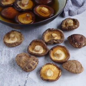 dried shiitake mushrooms with some in water.