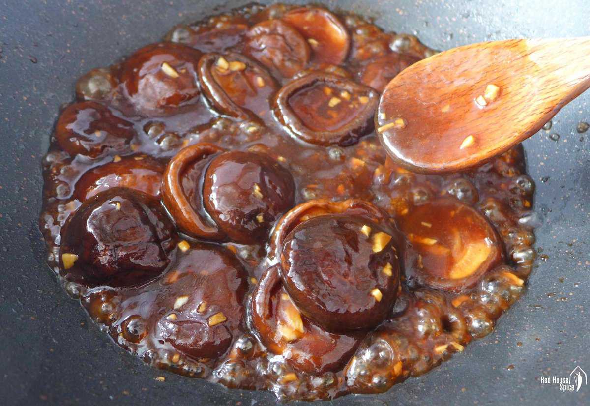 braised shiitake mushrooms in a thick, brown sauce