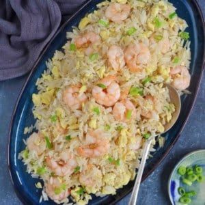 shrimp fried rice on a plate.