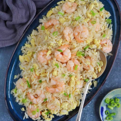 shrimp fried rice on a plate.