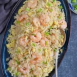 shrimp fried rice on a plate.