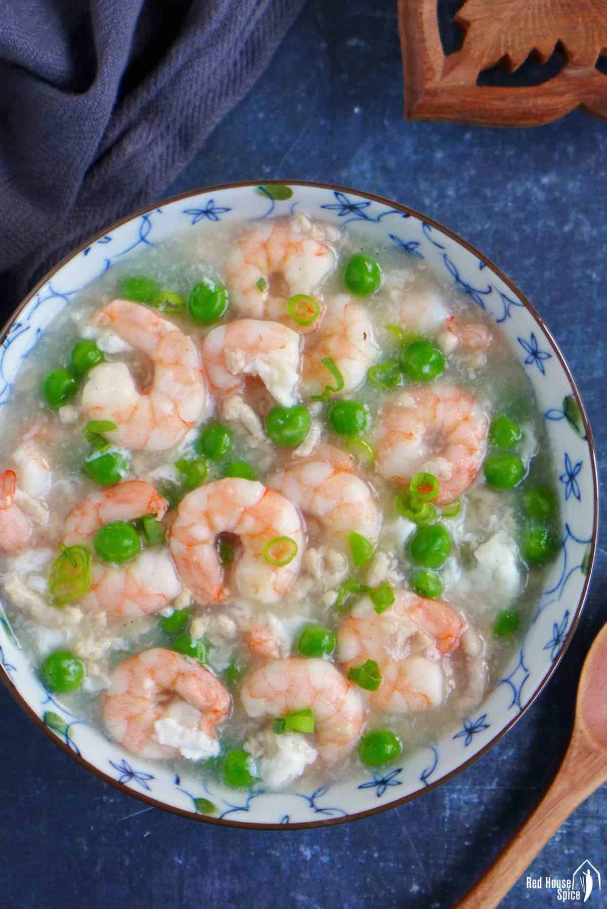 A bowl of shrimp with lobster sauce.