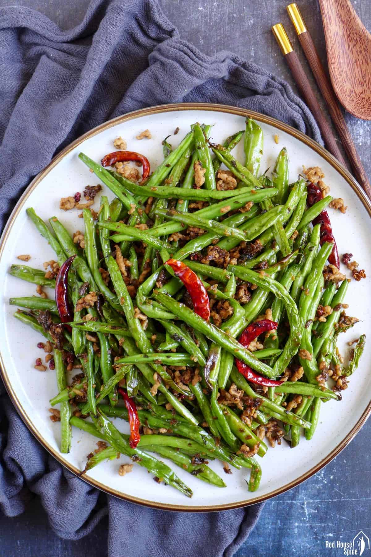 Sichuan dry fried green beans on a plate