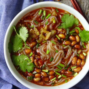 a bowl of hot and sour noodle soup.