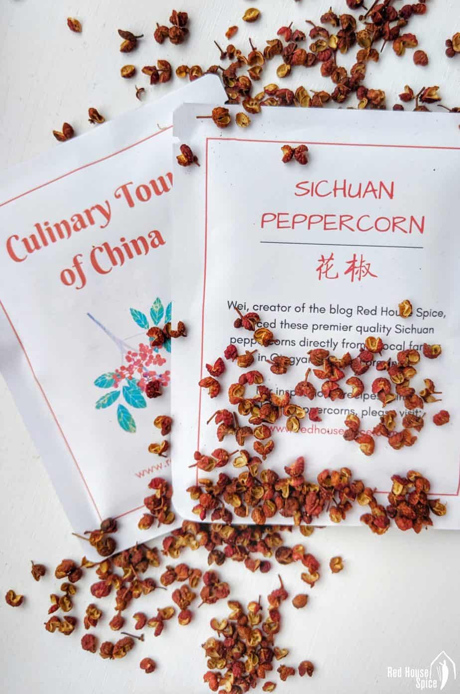 Two sachets and some loose Sichuan pepper