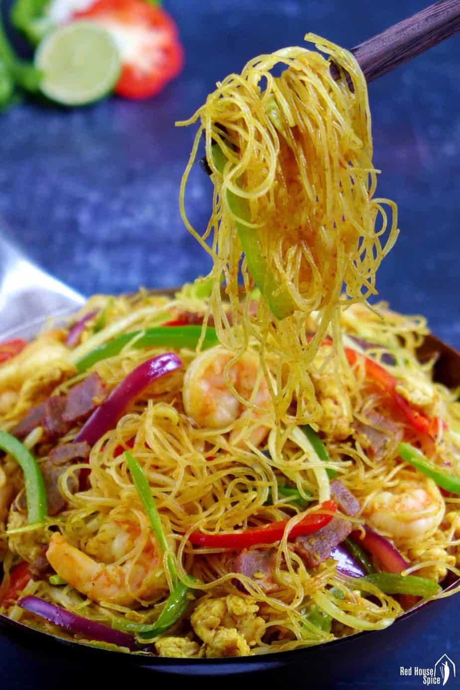Singapore Mei Fun picked up by chopsticks.
