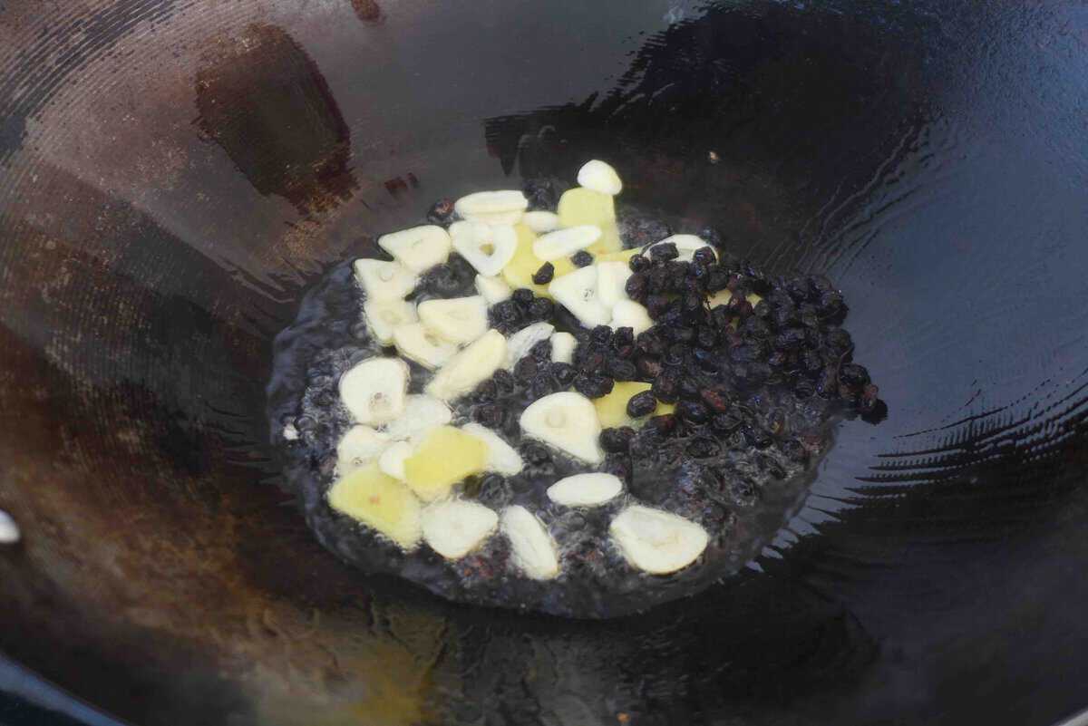 sizzling ginger, garlic, and fermented black beans.
