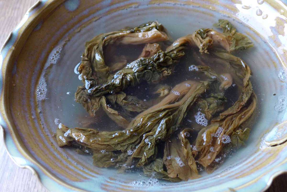 soaking preserved mustard in water.