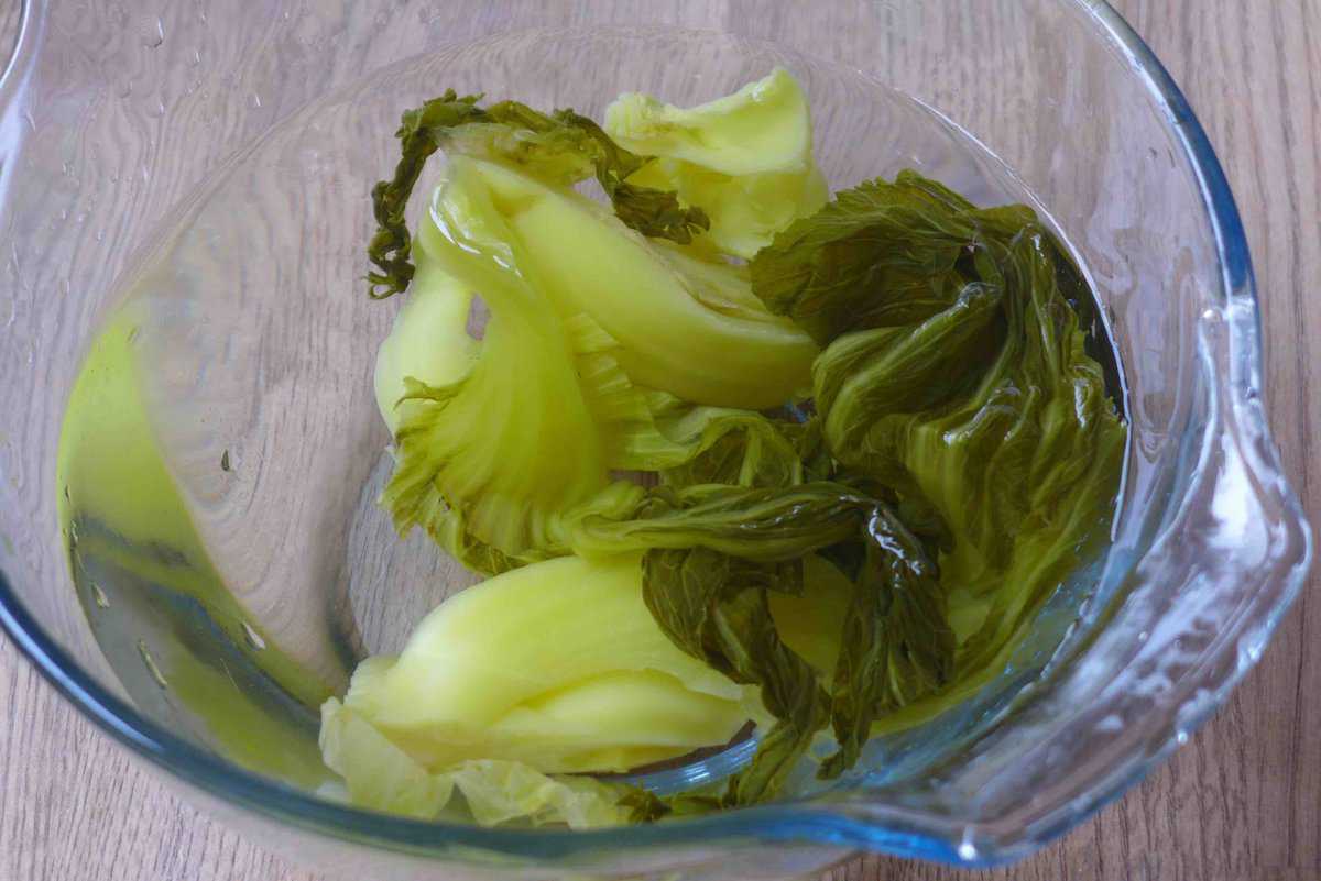 soaking pickled mustard greens in water.
