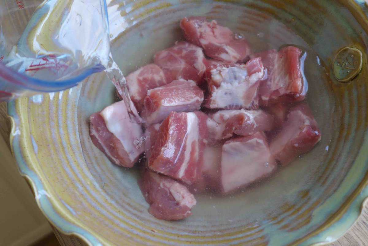 soaking ribs in water with baking soda.