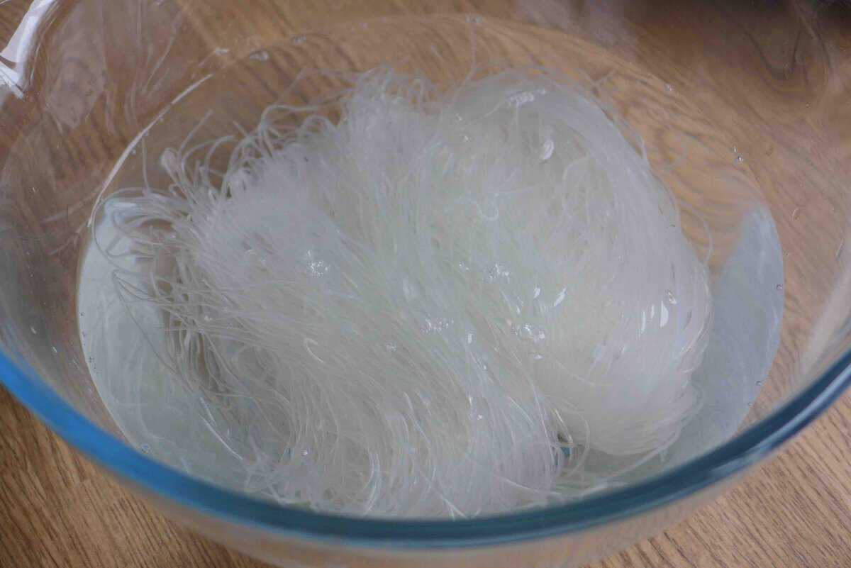 soaking mung bean vermicelli in water.