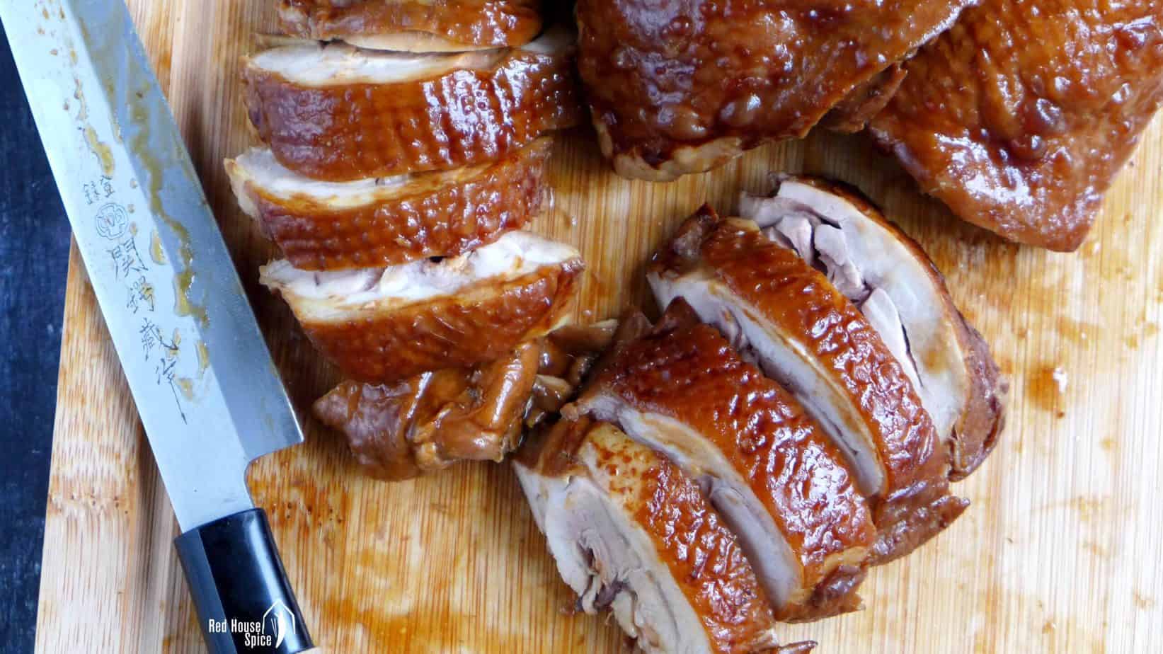 cutting cooked chicken