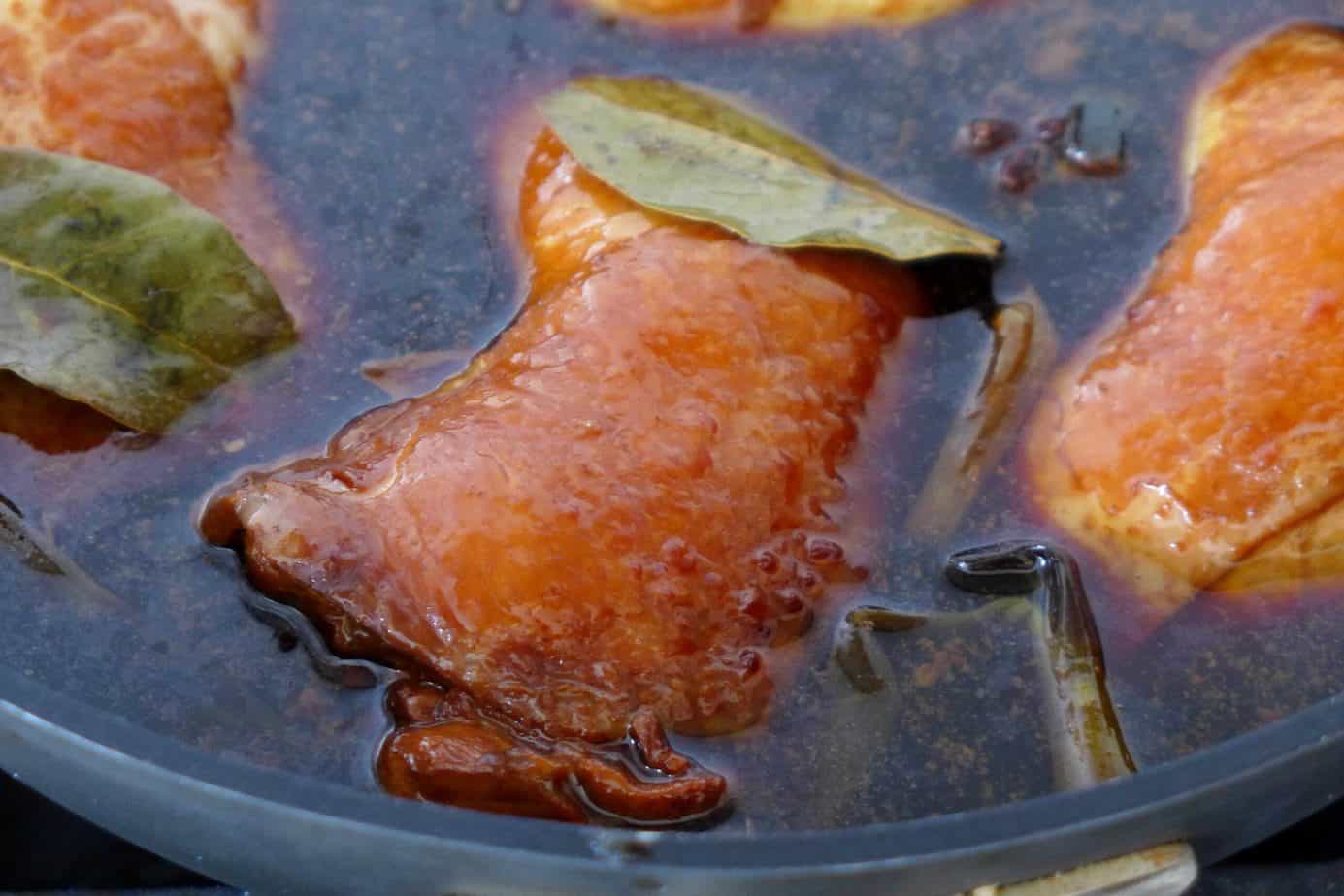 chicken in dark broth